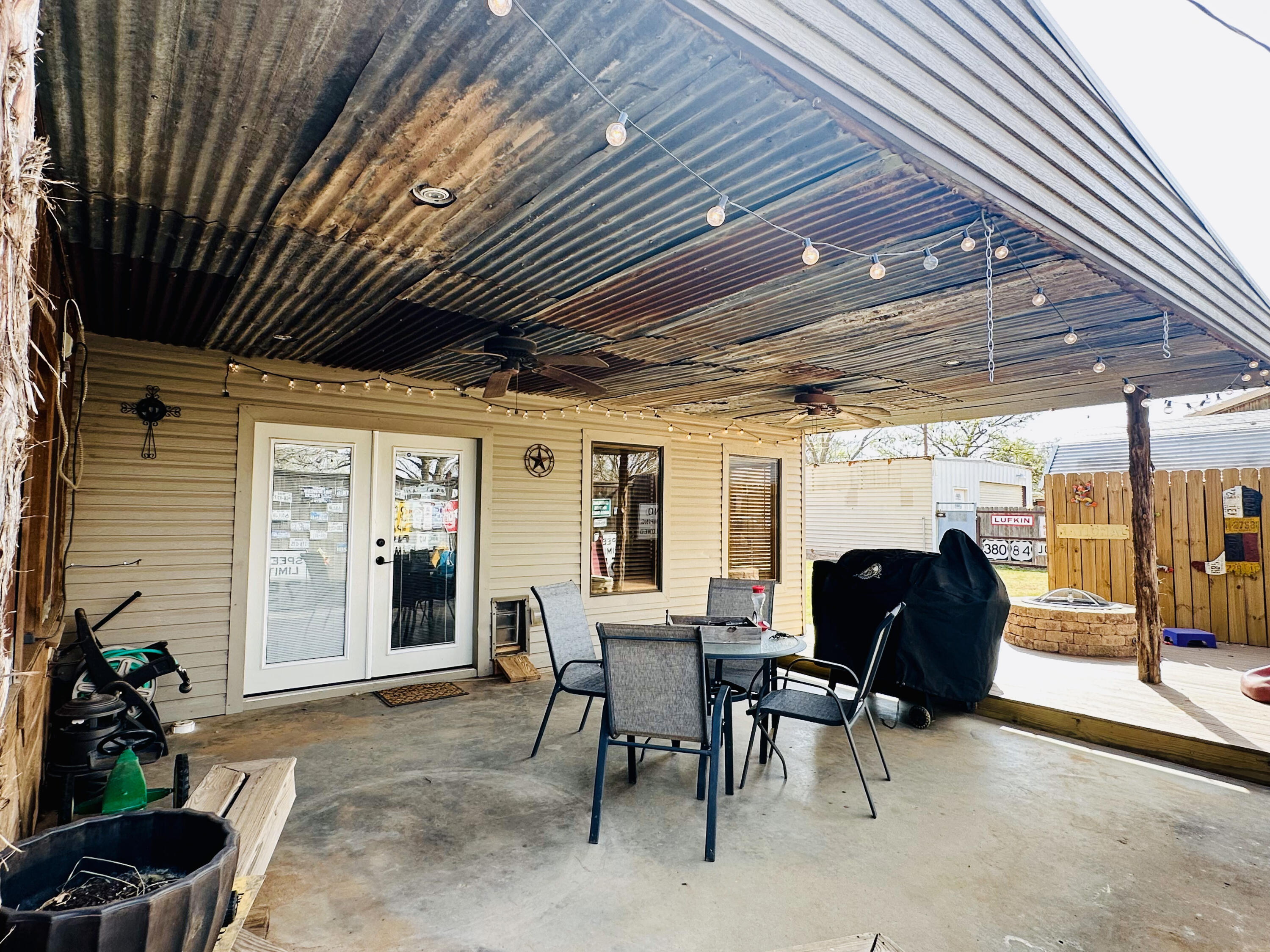 403 Osage Avenue Post, TX 79356 - Photo 28 of 31 a view of a livingroom with furniture and outdoor space
