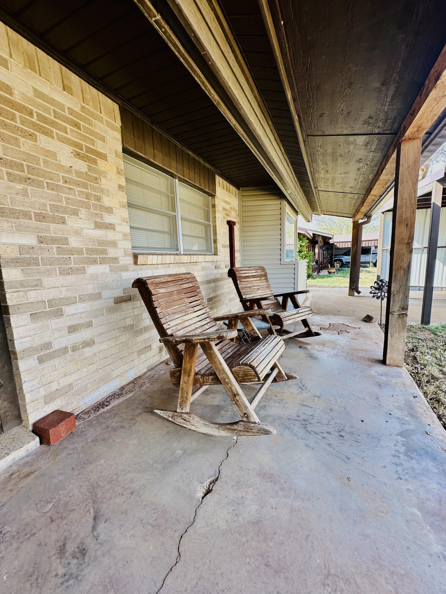 403 Osage Avenue Post, TX 79356 - Photo 5 of 31 a view of backyard with outdoor seating