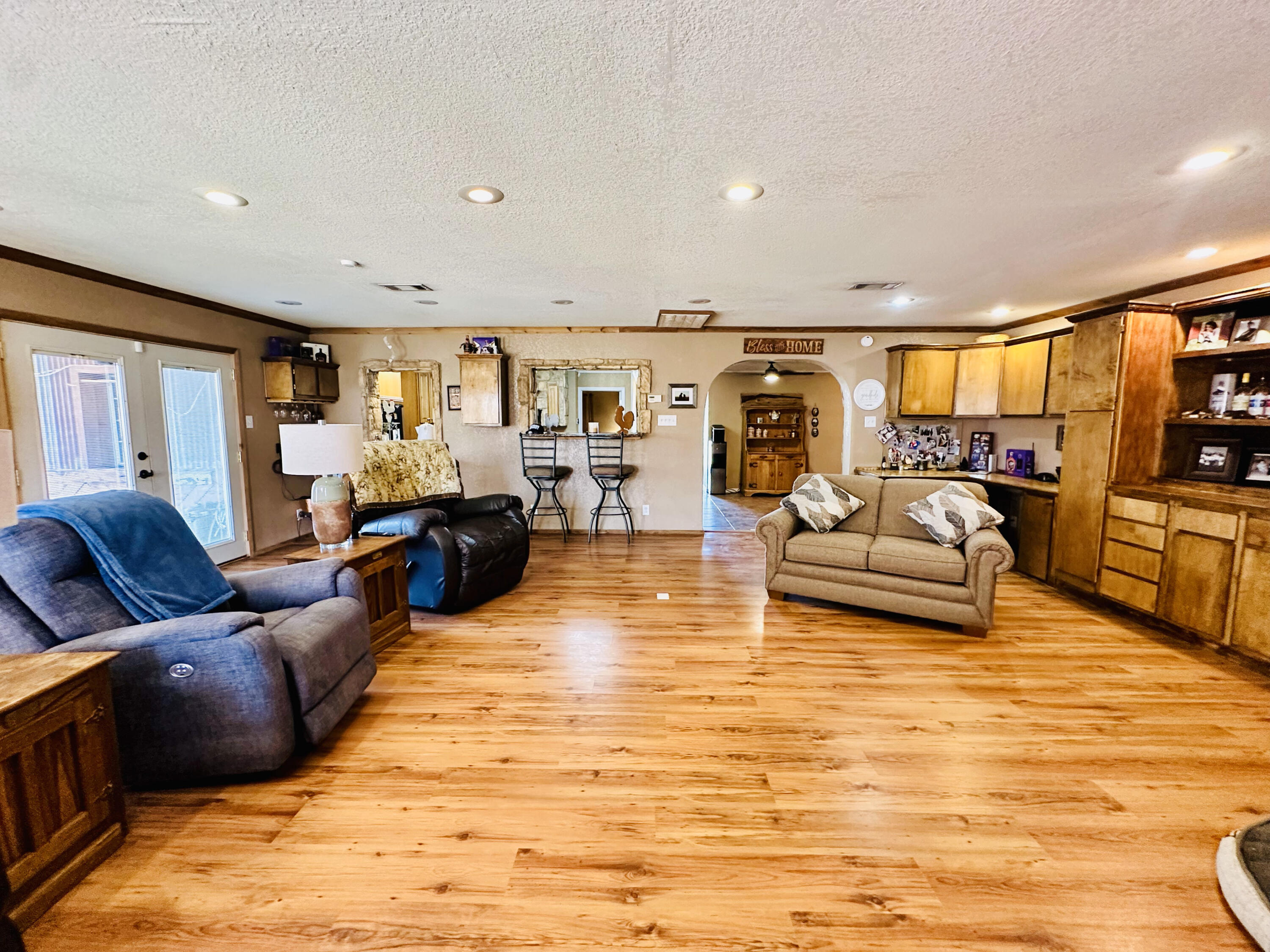 403 Osage Avenue Post, TX 79356 - Photo 7 of 31 a living room with furniture and a flat screen tv