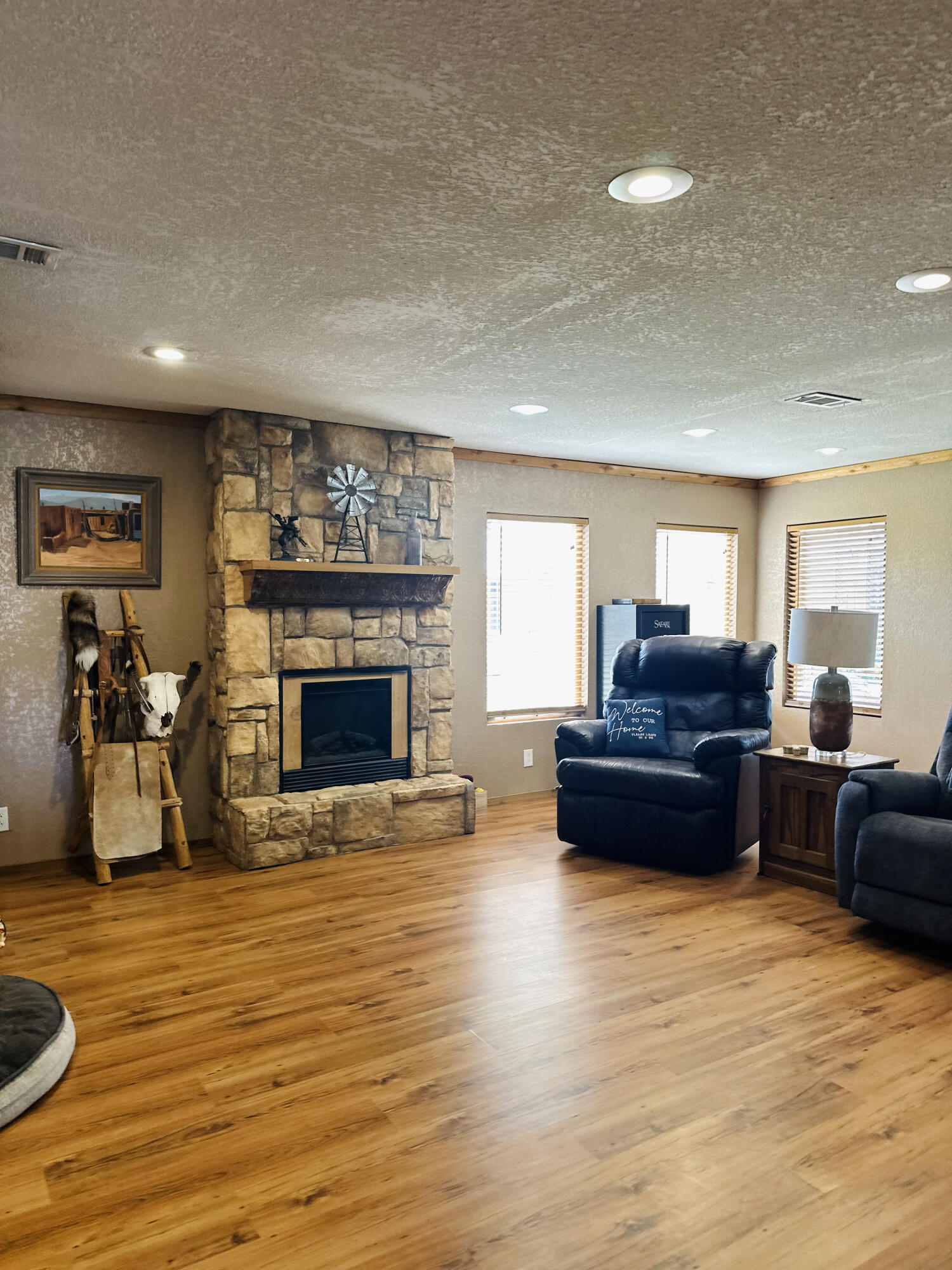 403 Osage Avenue Post, TX 79356 - Photo 9 of 31 a living room with furniture and a fireplace