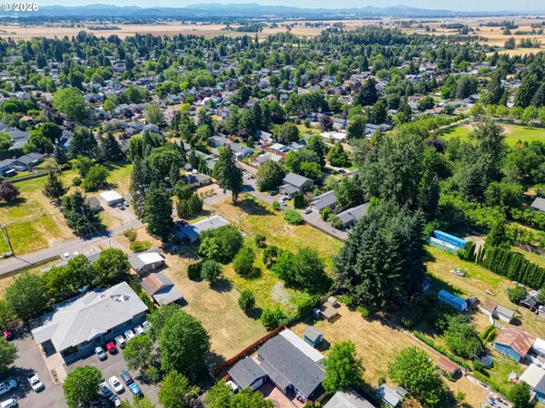 an aerial view of a city with lots of residential buildings