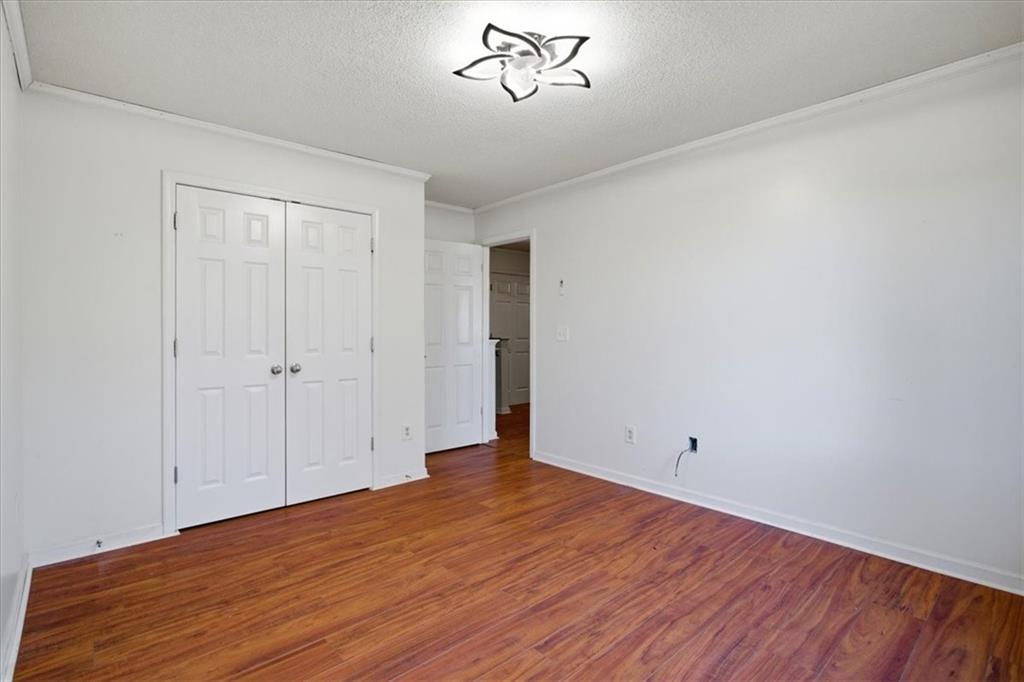 3018 Broadleaf Trail Road Fairburn, GA 30213 - Photo 15 of 26 a view of empty room with wooden floor