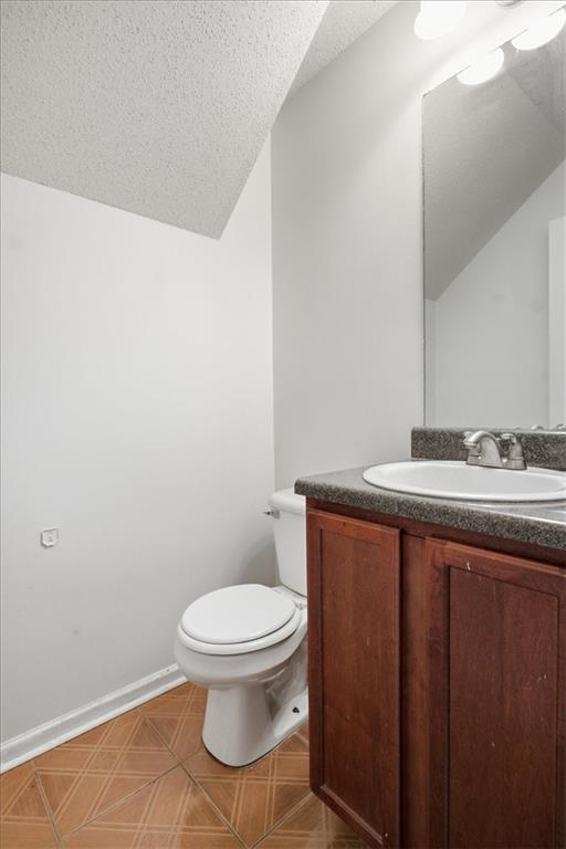 3018 Broadleaf Trail Road Fairburn, GA 30213 - Photo 18 of 26 a bathroom with a sink and a toilet