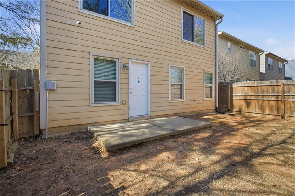3018 Broadleaf Trail Road Fairburn, GA 30213 - Photo 23 of 26 a view of a backyard with a large tree