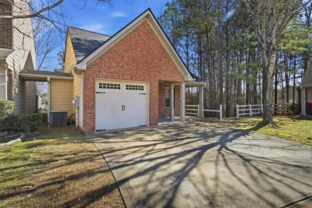 3018 Broadleaf Trail Road Fairburn, GA 30213 - Photo 3 of 26 a view of a house with a yard