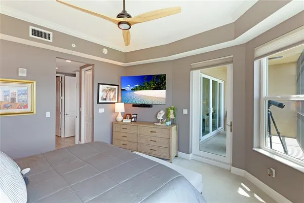 a room with wine cabinets and a window