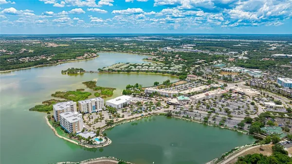 a view of a lake with a city