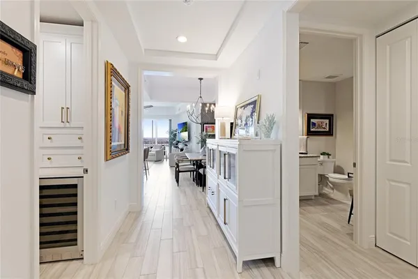 a view of a hallway with washer and dryer