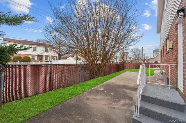 a view of a backyard with a house