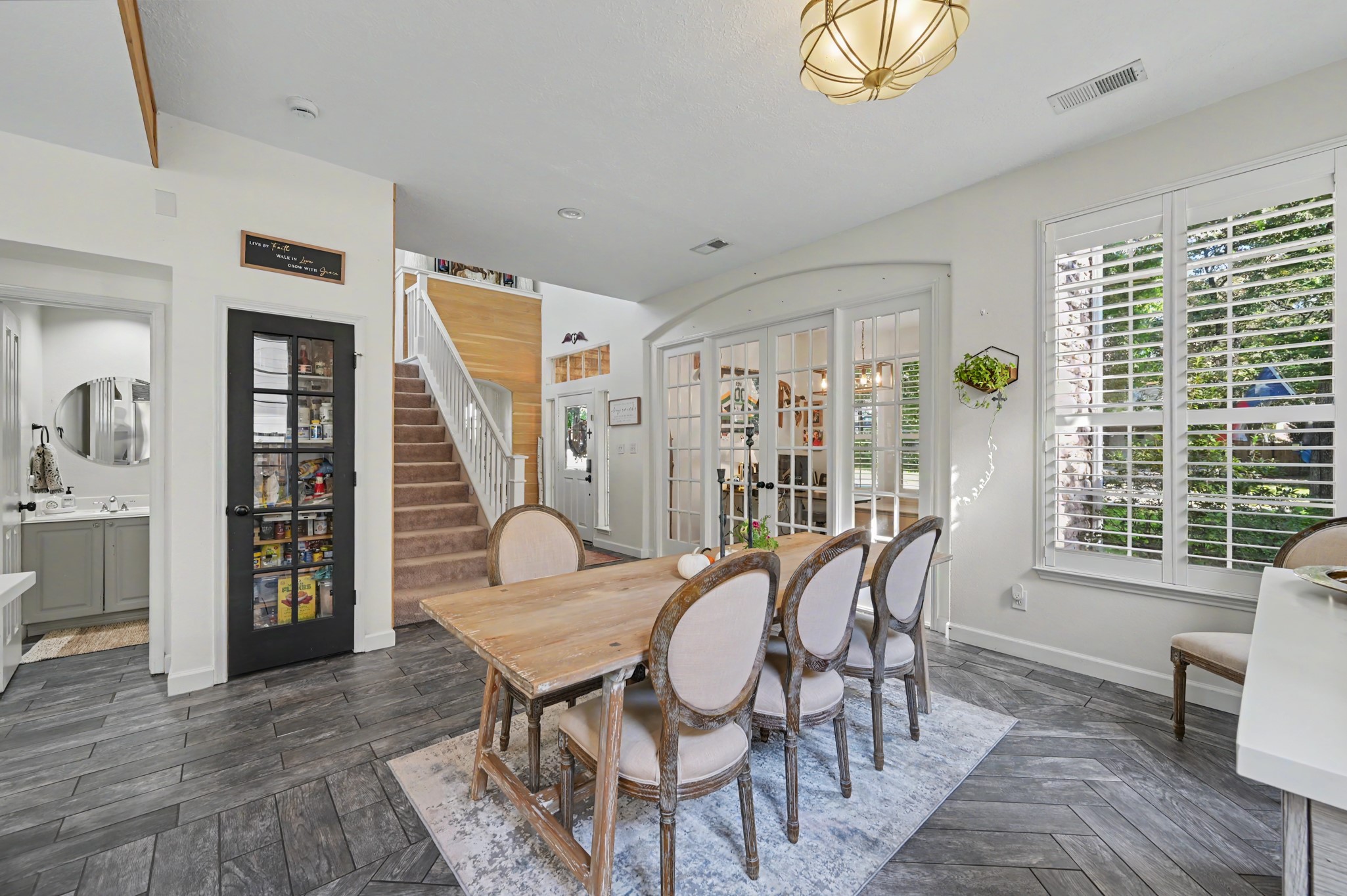 55 South Bethany Bend Circle Spring, TX 77382 - Photo 7 of 28 The oversized study and dining area is bathed in natural light, creating a bright, open, and inviting atmosphere.