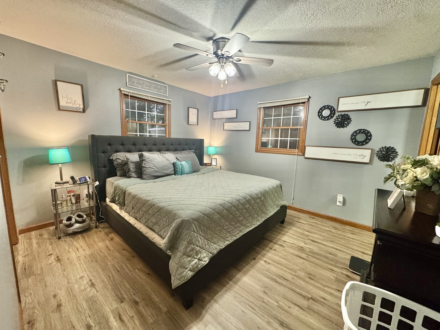 308 North Alexander Street Clinton, IL 61727 - Photo 11 of 20 a bedroom with a bed and wooden floor