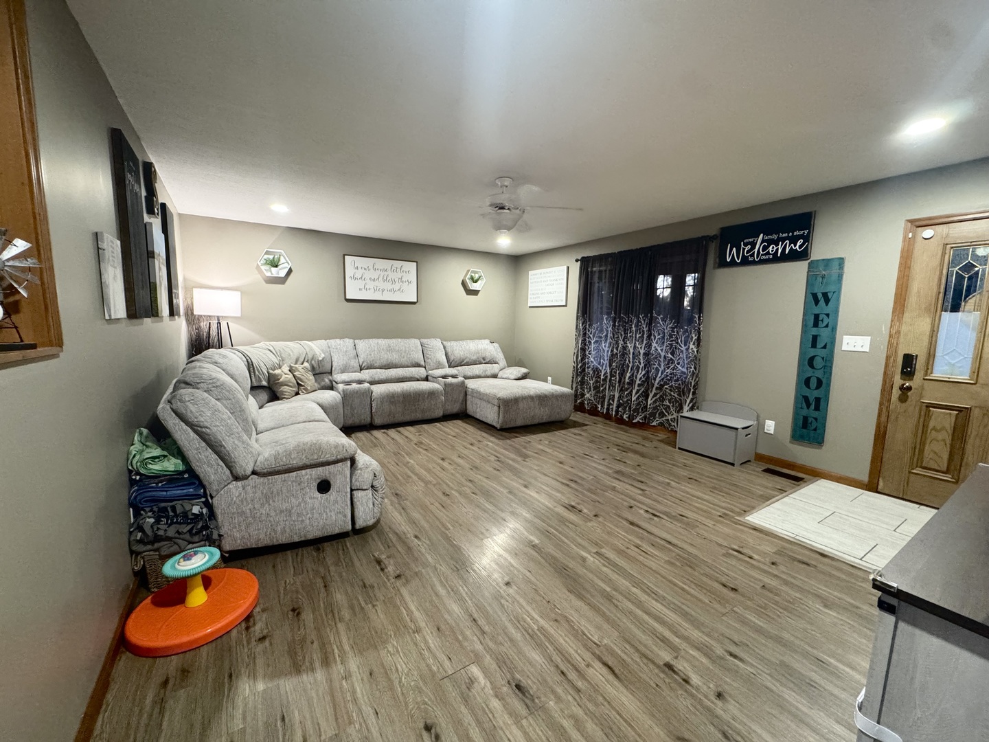 308 North Alexander Street Clinton, IL 61727 - Photo 5 of 20 a living room with furniture and a wooden floor