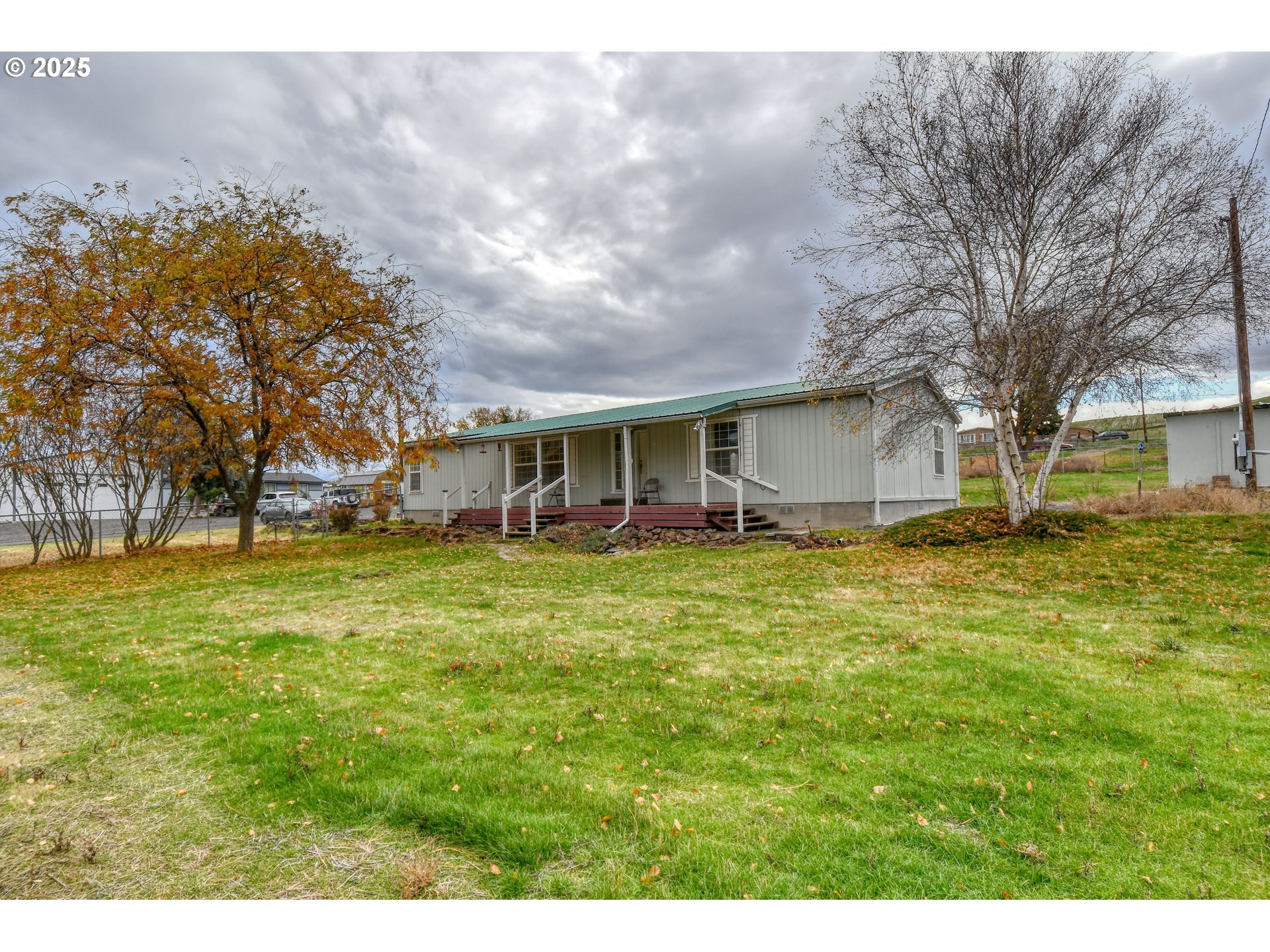 73306 Southeast 54th Street Pendleton, OR 97801 - Photo 1 of 39 a view of a house with a big yard