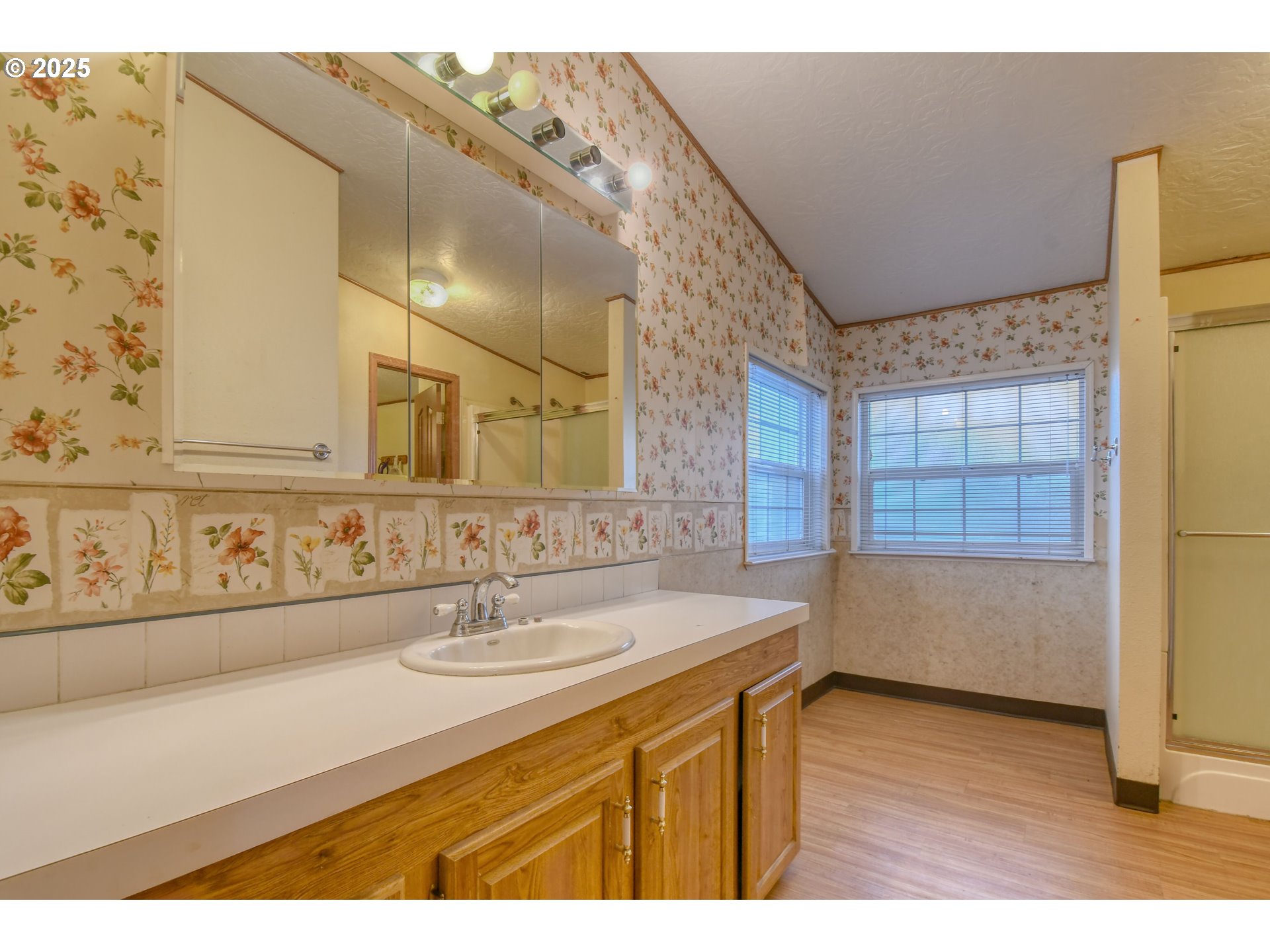 73306 Southeast 54th Street Pendleton, OR 97801 - Photo 14 of 39 a bathroom with a sink and a mirror