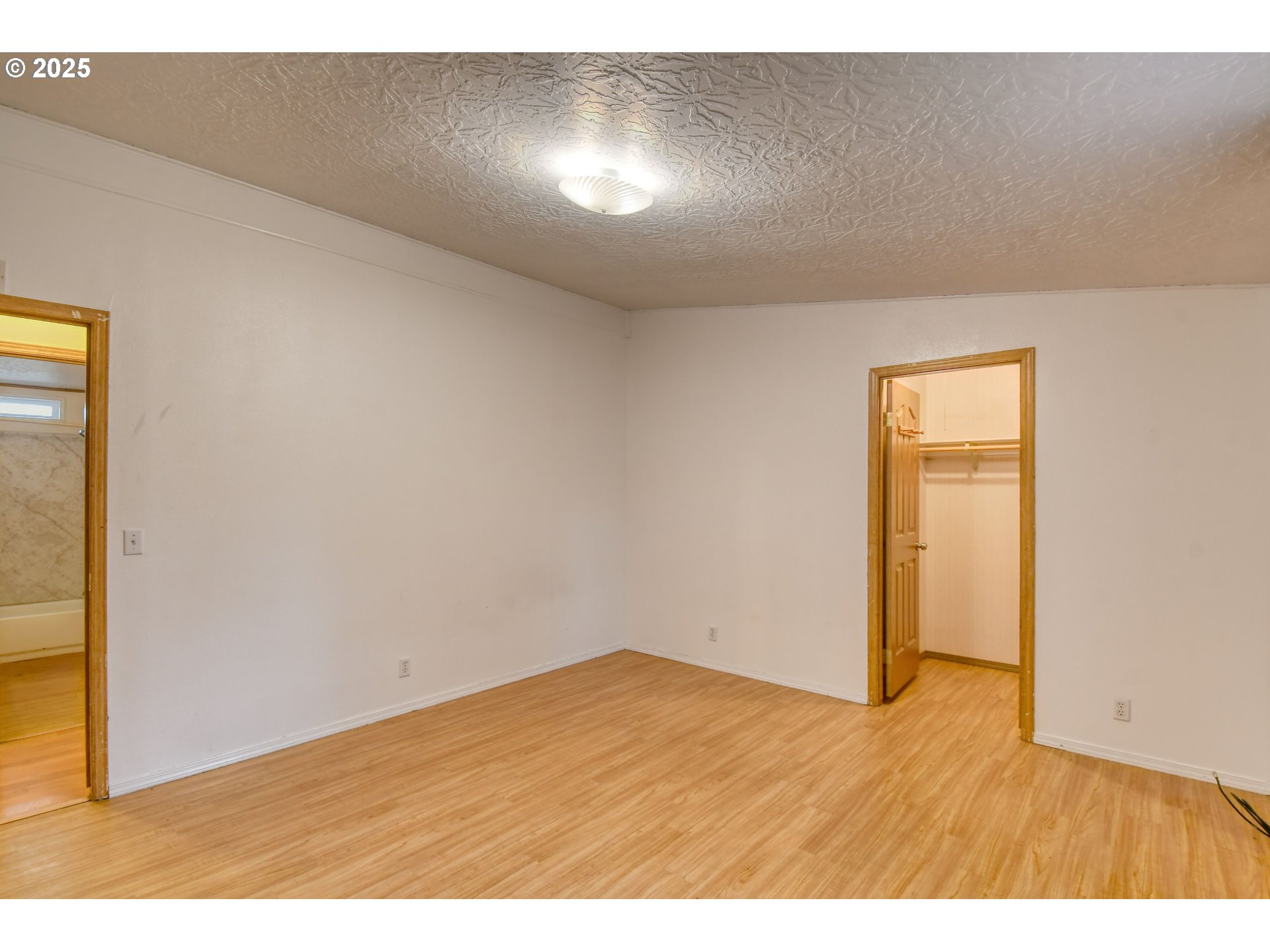 73306 Southeast 54th Street Pendleton, OR 97801 - Photo 18 of 39 a view of an empty room and wooden floor