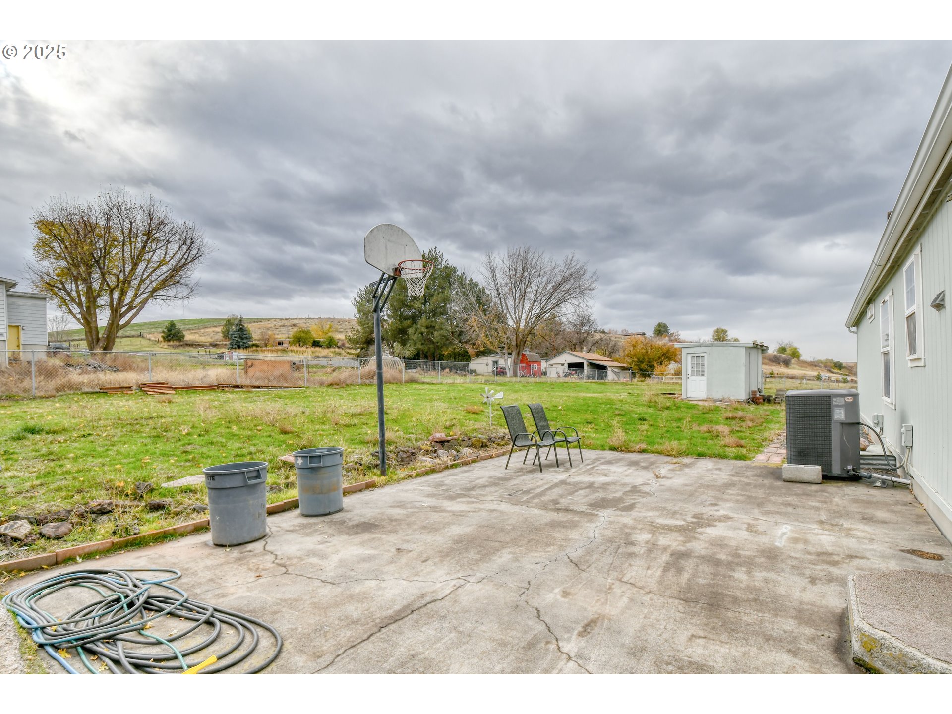 73306 Southeast 54th Street Pendleton, OR 97801 - Photo 35 of 39 a view of a lake with a houses in back