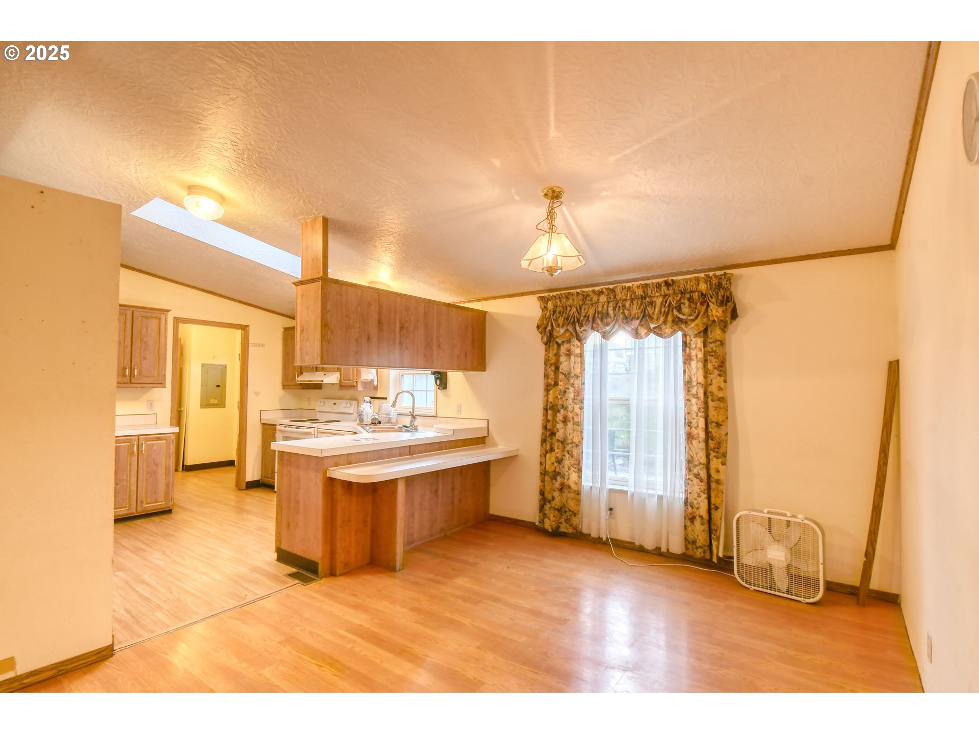 73306 Southeast 54th Street Pendleton, OR 97801 - Photo 6 of 39 a view of a kitchen with a sink and a window