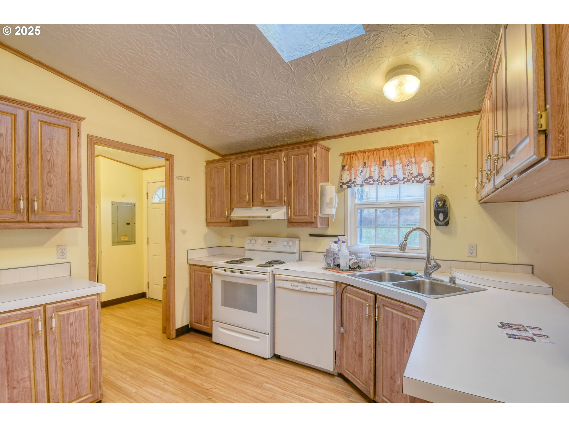 73306 Southeast 54th Street Pendleton, OR 97801 - Photo 8 of 39 a kitchen with a sink stove and cabinets