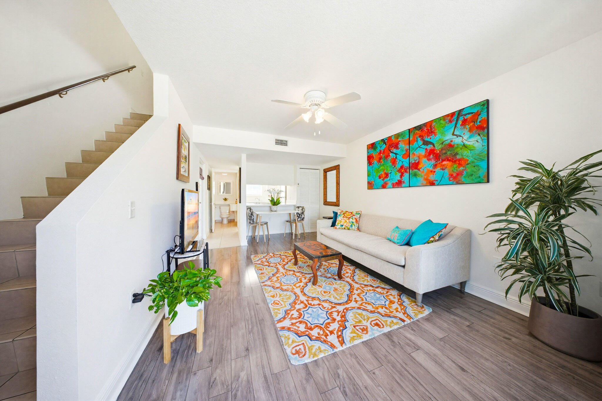 63 Seaside N Court Key West, FL 33040 - Photo 15 of 40 a living room with furniture and a potted plant