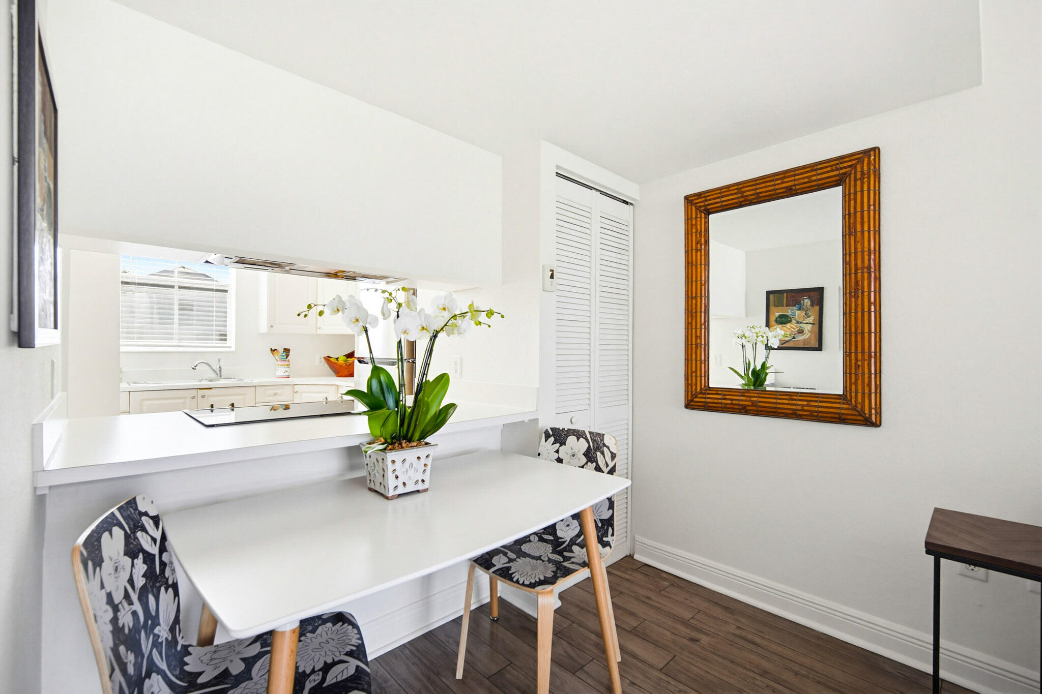 63 Seaside N Court Key West, FL 33040 - Photo 21 of 40 a view of a dining room with furniture window and wooden floor