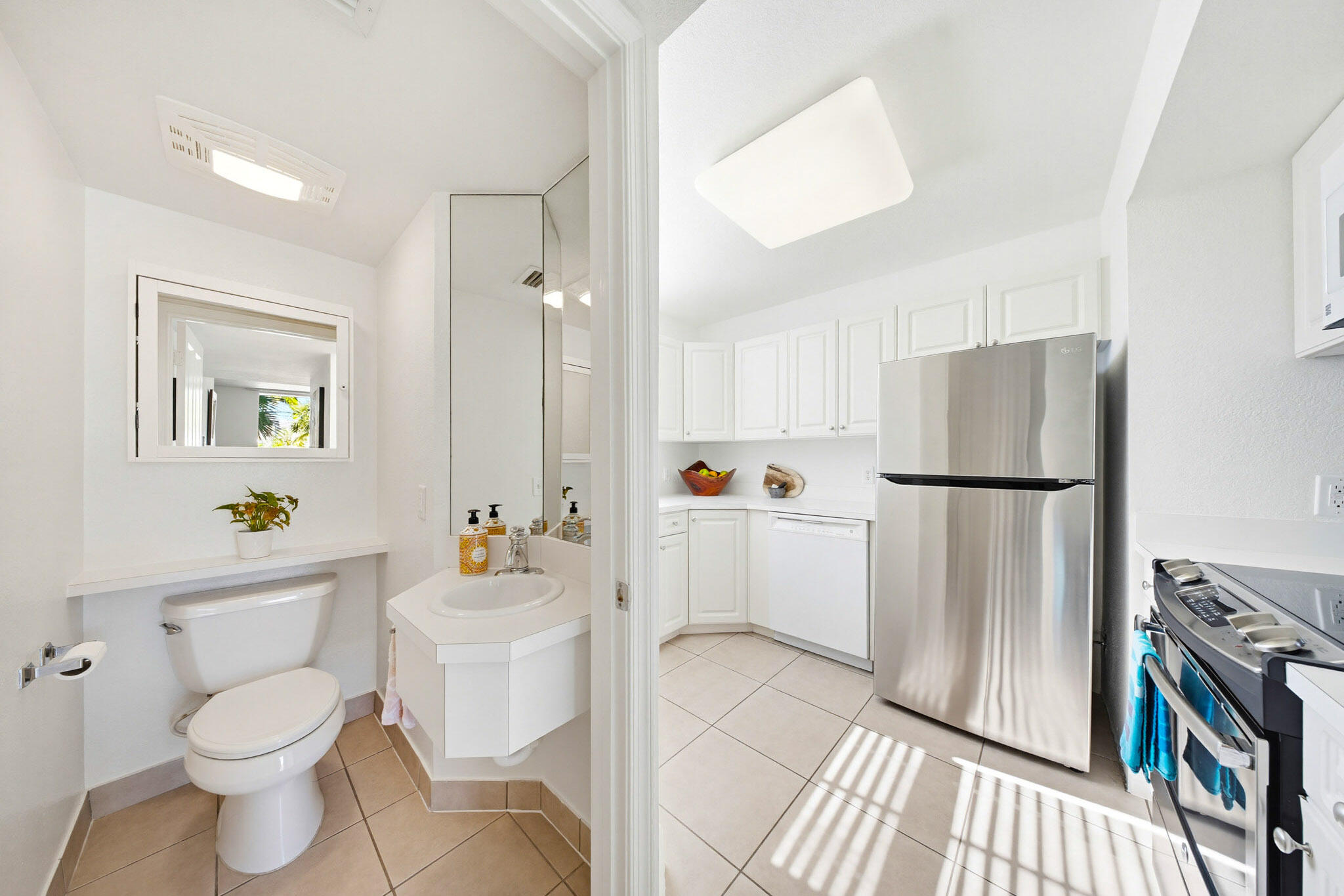 63 Seaside N Court Key West, FL 33040 - Photo 22 of 40 a bathroom with a sink toilet and shower