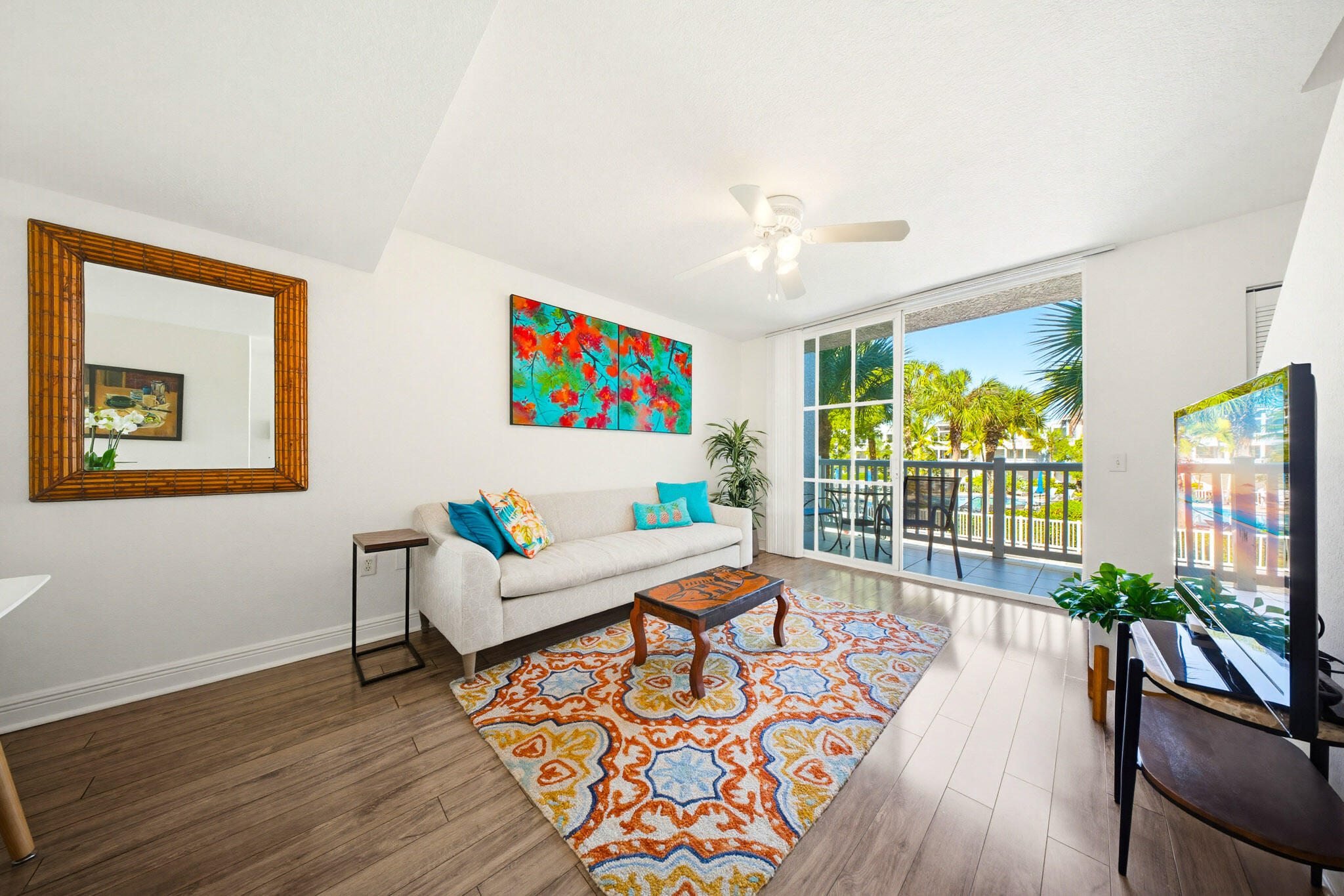 63 Seaside N Court Key West, FL 33040 - Photo 26 of 40 a living room with furniture and a large window