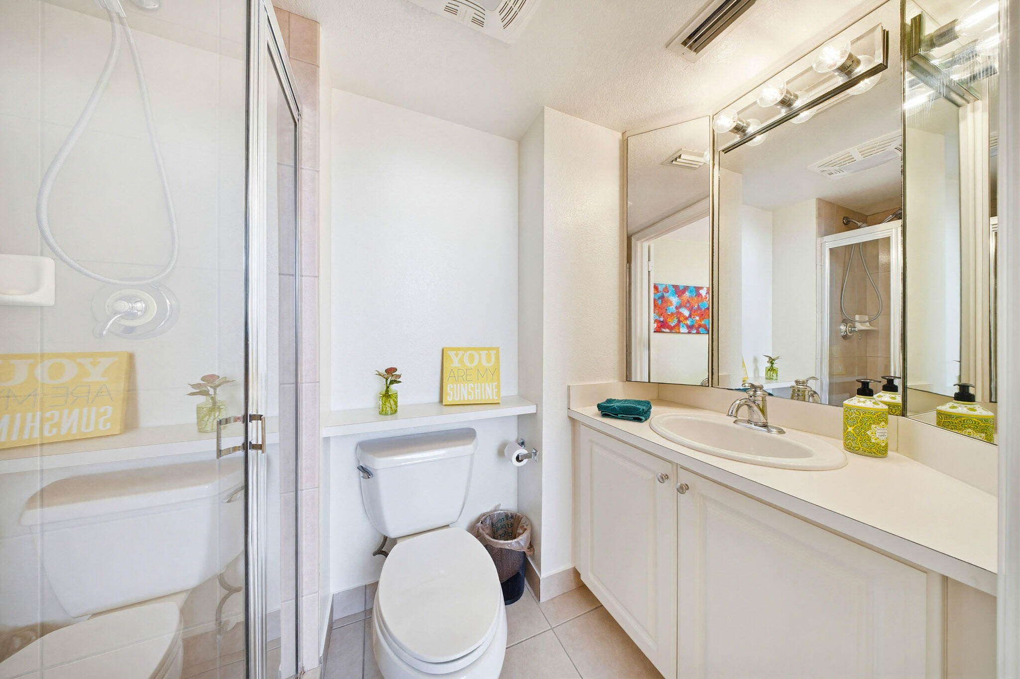 63 Seaside N Court Key West, FL 33040 - Photo 29 of 40 a bathroom with a granite countertop toilet sink and mirror
