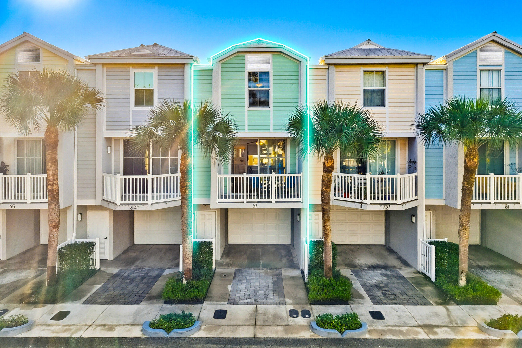 63 Seaside N Court Key West, FL 33040 - Photo 3 of 40 a front view of a house with garden