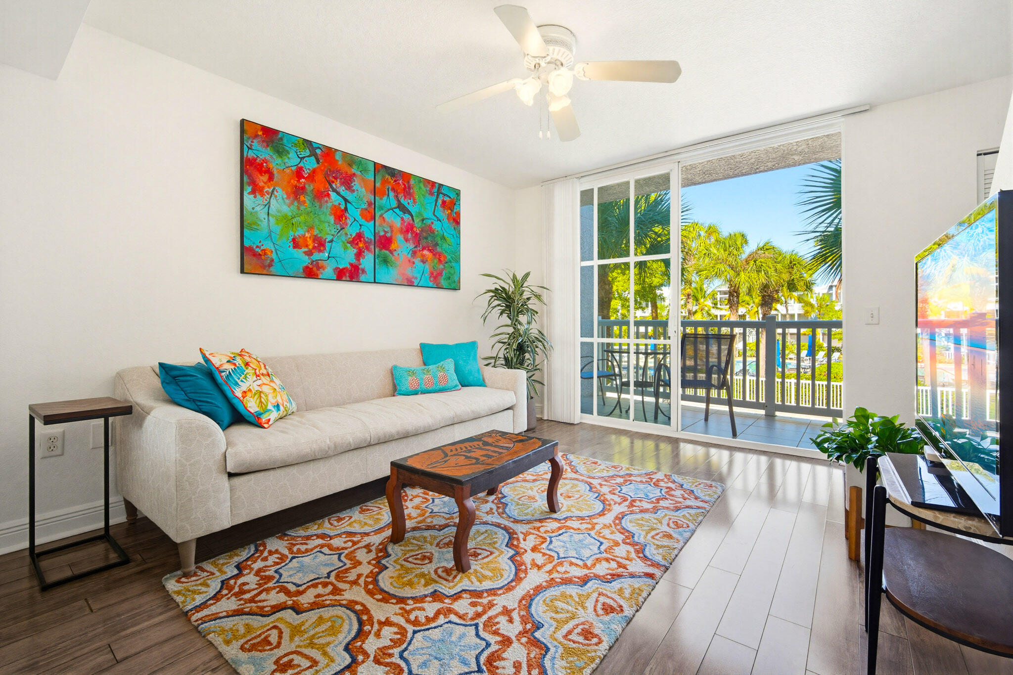 63 Seaside N Court Key West, FL 33040 - Photo 6 of 40 a living room with furniture and a large window