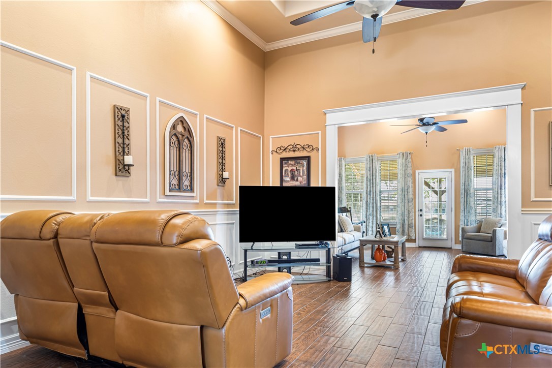790 Spanish Grant Road Goliad, TX 77963 - Photo 5 of 41 a living room with furniture and a flat screen tv