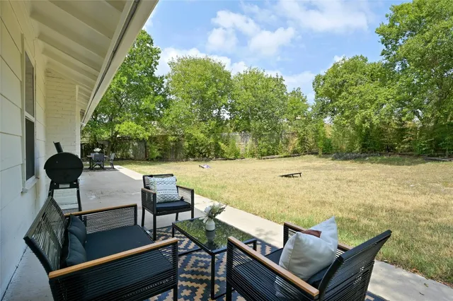a view of yard and outdoor seating