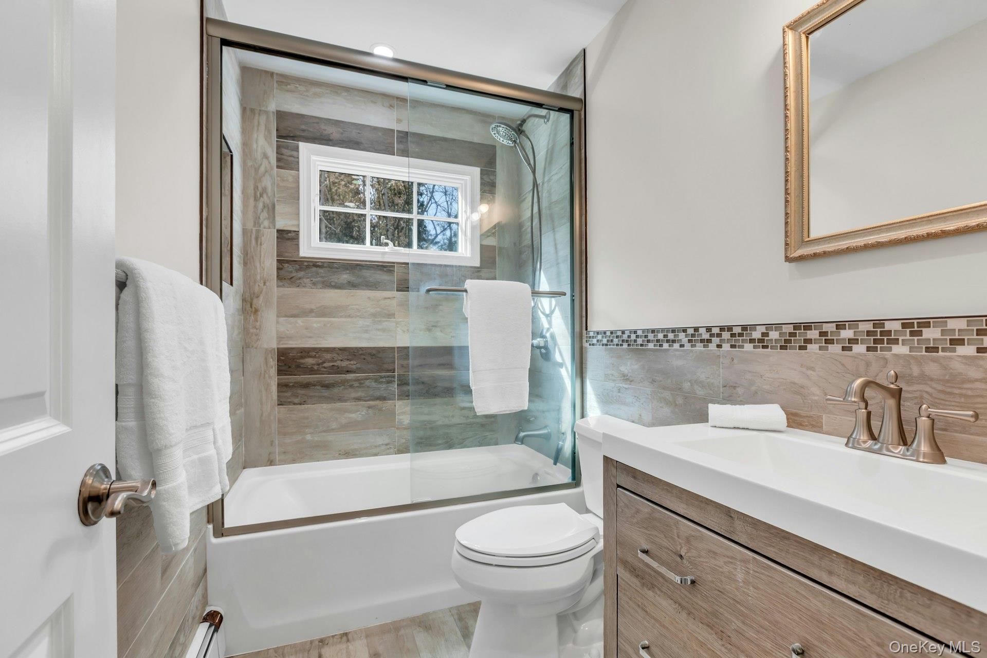 76 Maple Street Bayport, NY 11705 - Photo 28 of 38 First Floor Bathroom