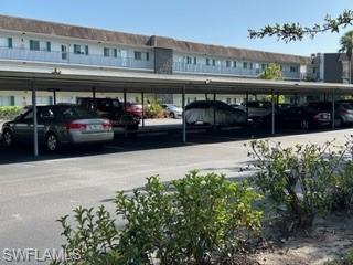 5651 Rattlesnake Hamm Road, Unit C107 Naples, FL 34113 - Photo 2 of 20 COVERED PARKING AREA FOR YOUR VEHICLE