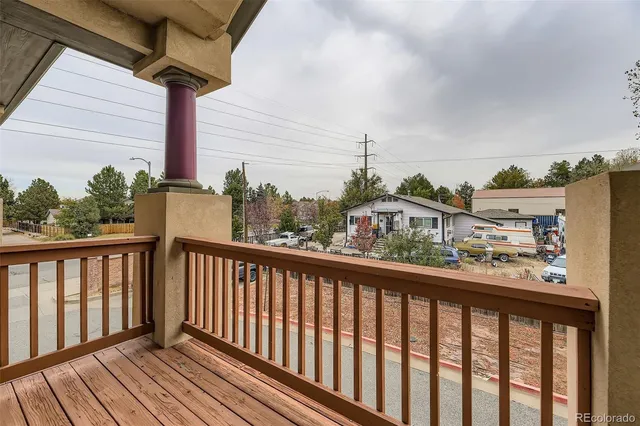 a view of a street from a balcony