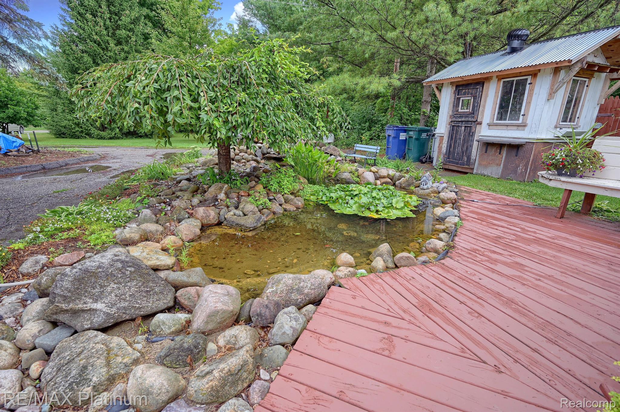 5799 Warner Road Fowlerville, MI 48836 - Photo 35 of 40 POND AND DECK