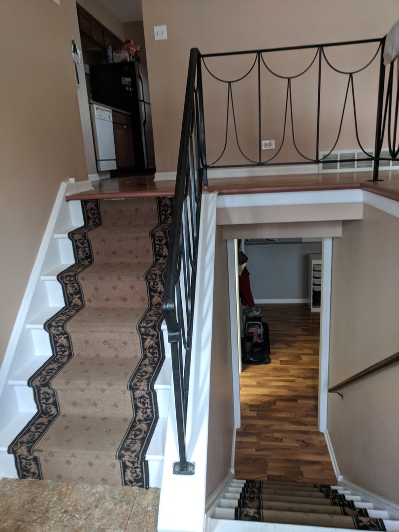 484 Rockhurst Road Bolingbrook, IL 60440 - Photo 3 of 34 a view of staircase with white walls