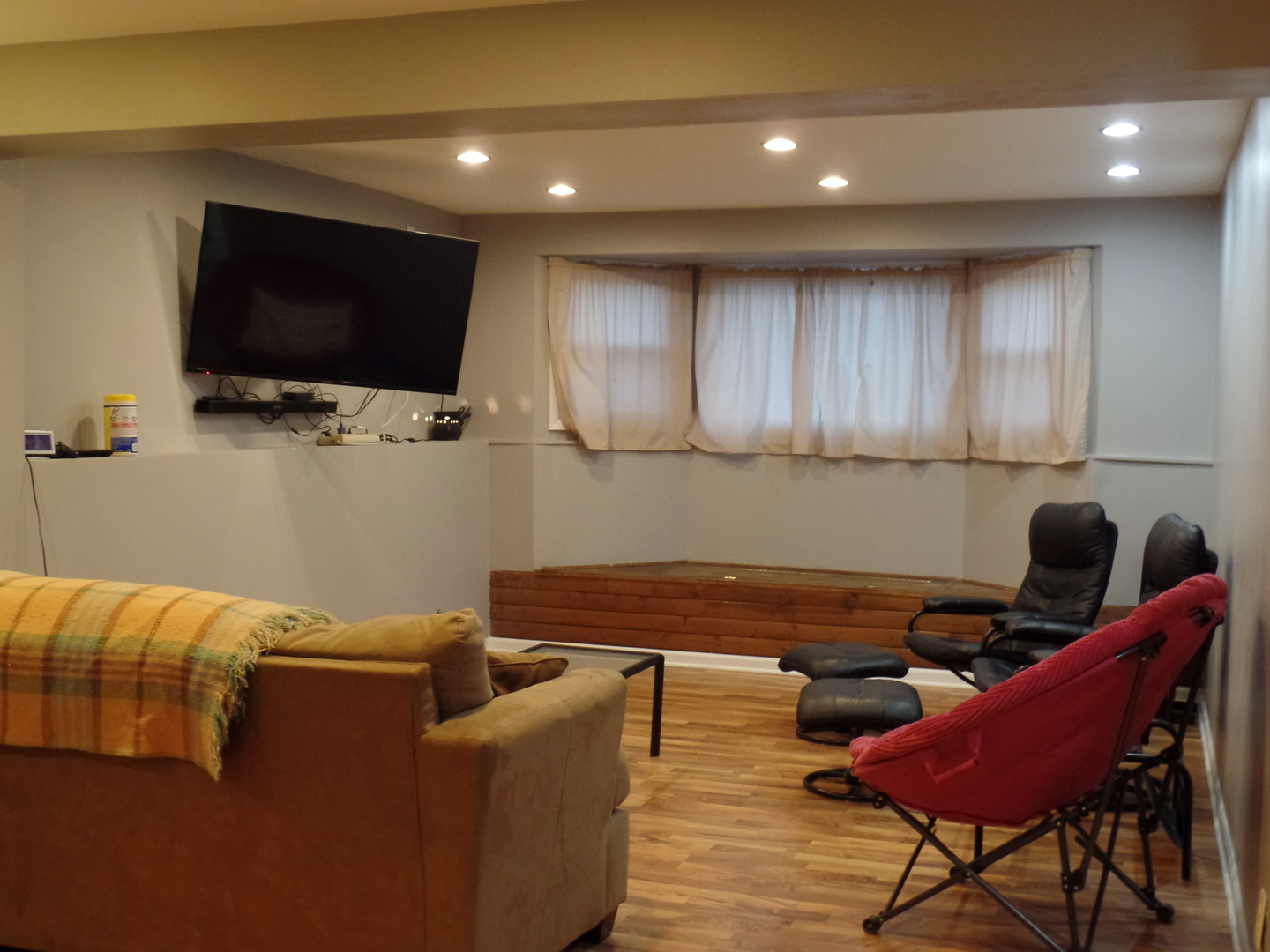 484 Rockhurst Road Bolingbrook, IL 60440 - Photo 21 of 34 a living room with furniture and a flat screen tv