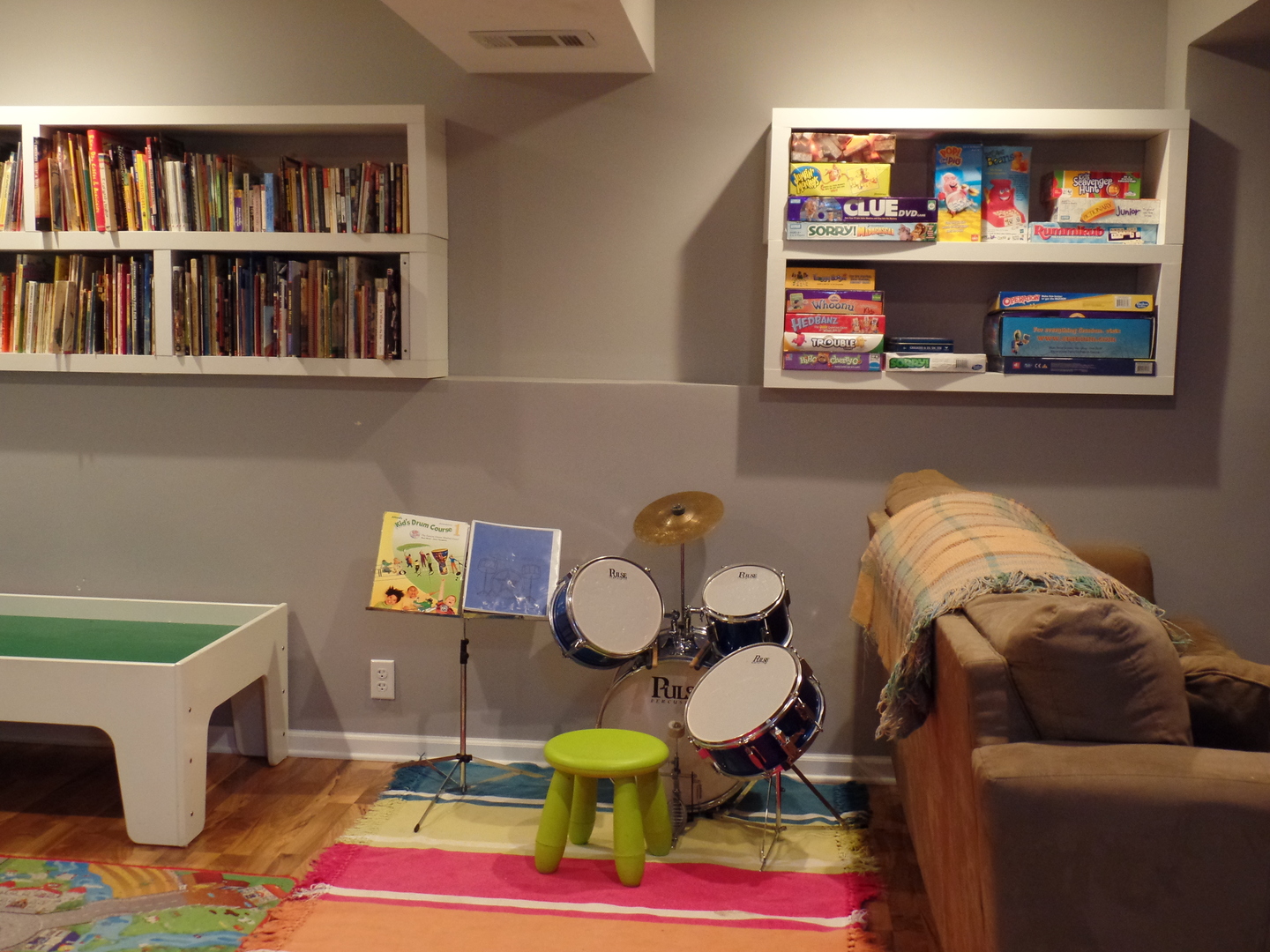 484 Rockhurst Road Bolingbrook, IL 60440 - Photo 22 of 34 a living room with furniture and book shelf