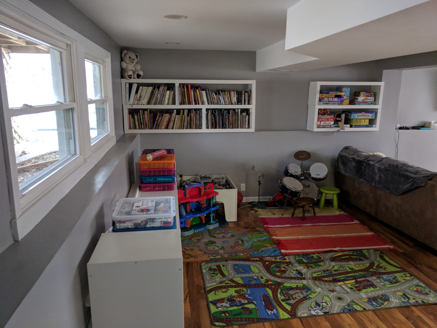 484 Rockhurst Road Bolingbrook, IL 60440 - Photo 25 of 34 a living room with furniture a rug and a window