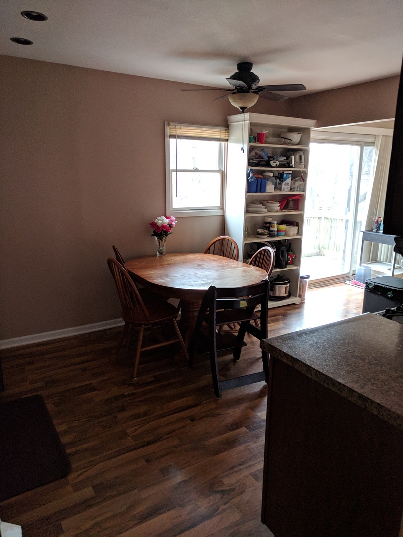484 Rockhurst Road Bolingbrook, IL 60440 - Photo 9 of 34 a view of a dining room with furniture and window