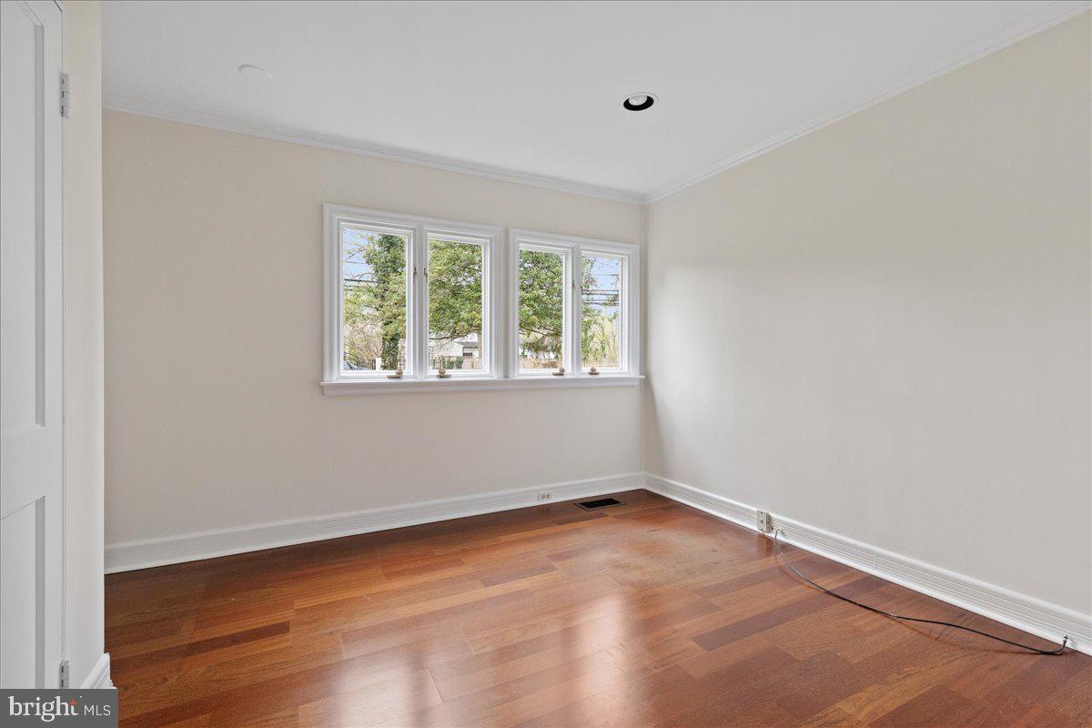 237 Elm Road Princeton, NJ 08540 - Photo 11 of 26 wooden floor in an empty room with a window