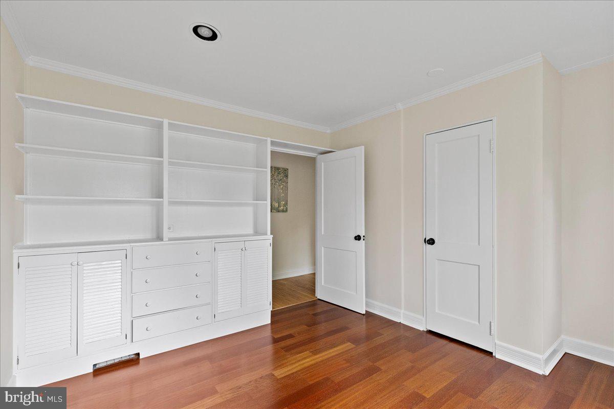237 Elm Road Princeton, NJ 08540 - Photo 12 of 26 a view of an empty room with wooden floor