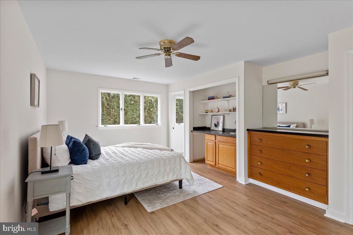 237 Elm Road Princeton, NJ 08540 - Photo 16 of 26 a bedroom with a bed and a dresser