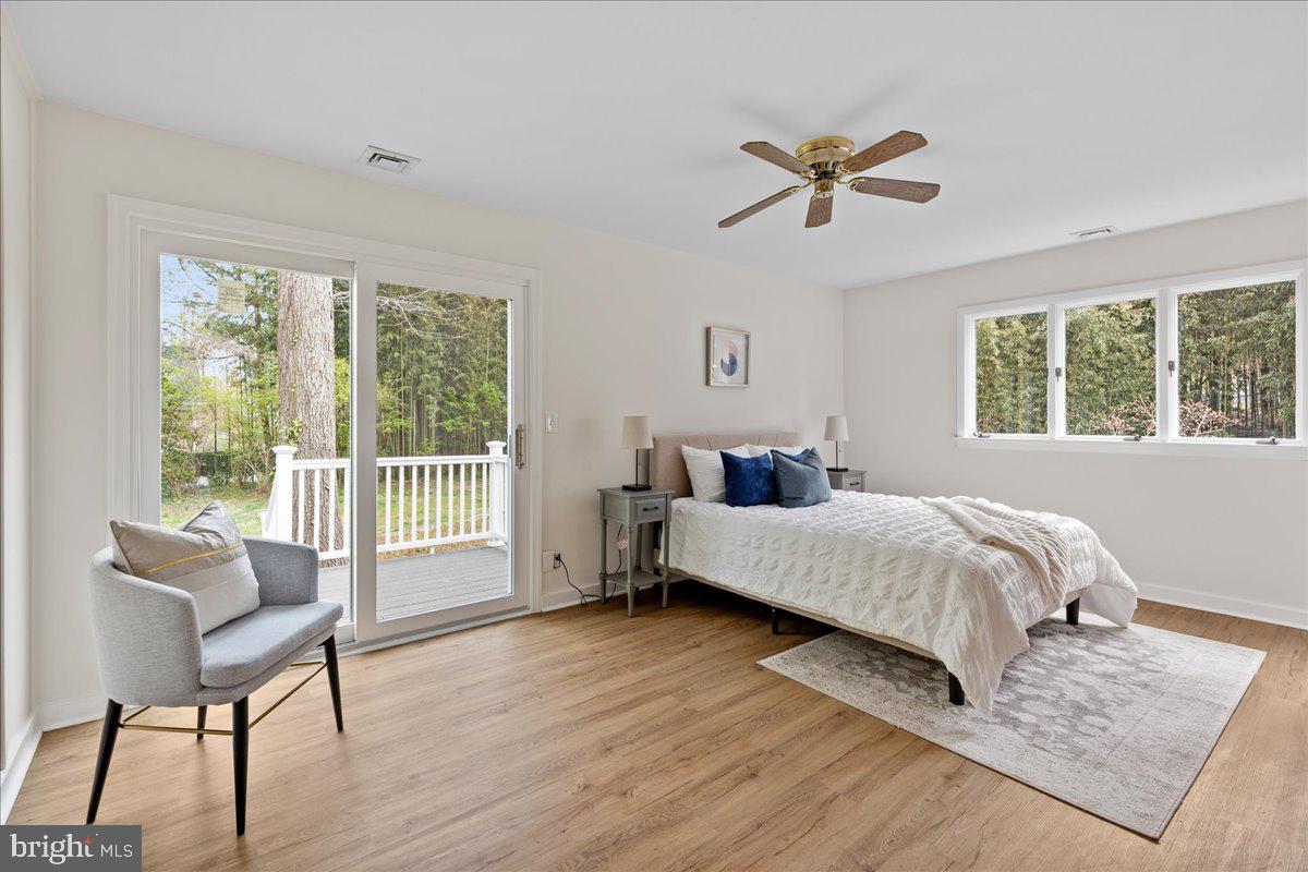 237 Elm Road Princeton, NJ 08540 - Photo 17 of 26 a bedroom with a bed and a view of balcony