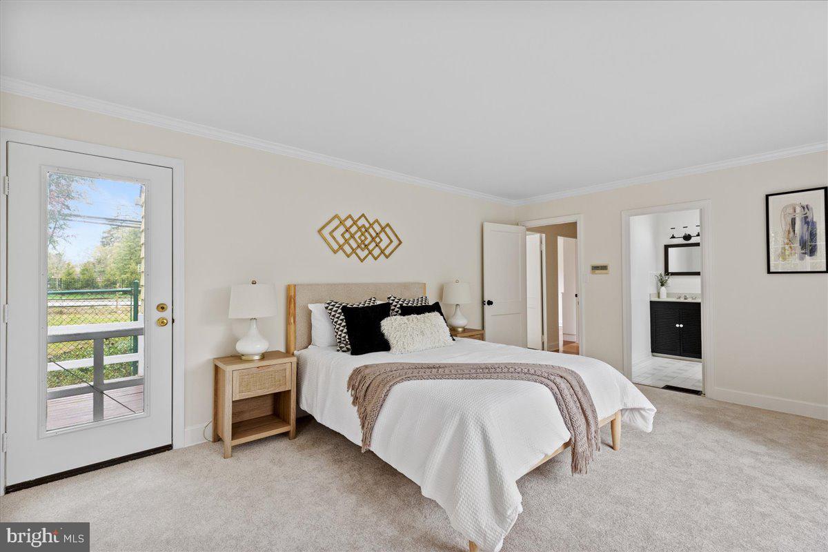 237 Elm Road Princeton, NJ 08540 - Photo 18 of 26 a bedroom with a bed and a large window