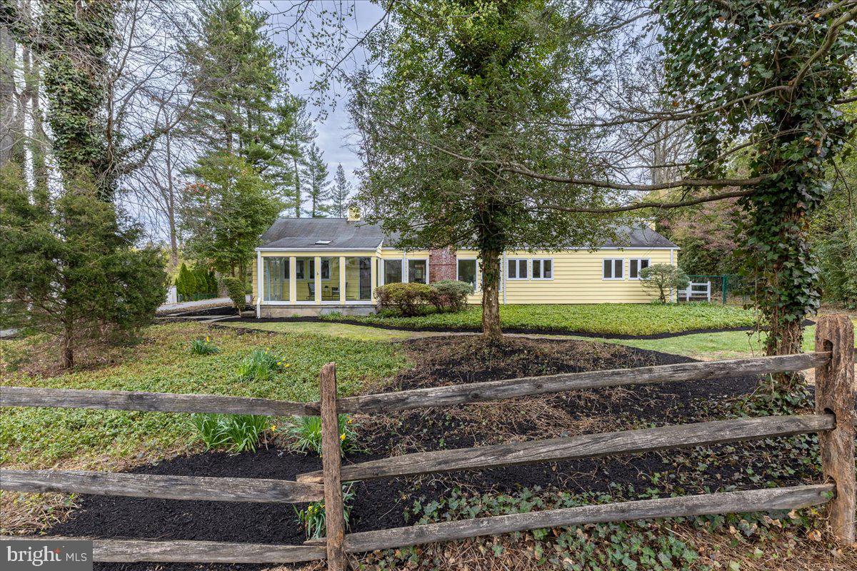 237 Elm Road Princeton, NJ 08540 - Photo 21 of 26 a front view of a house with a garden