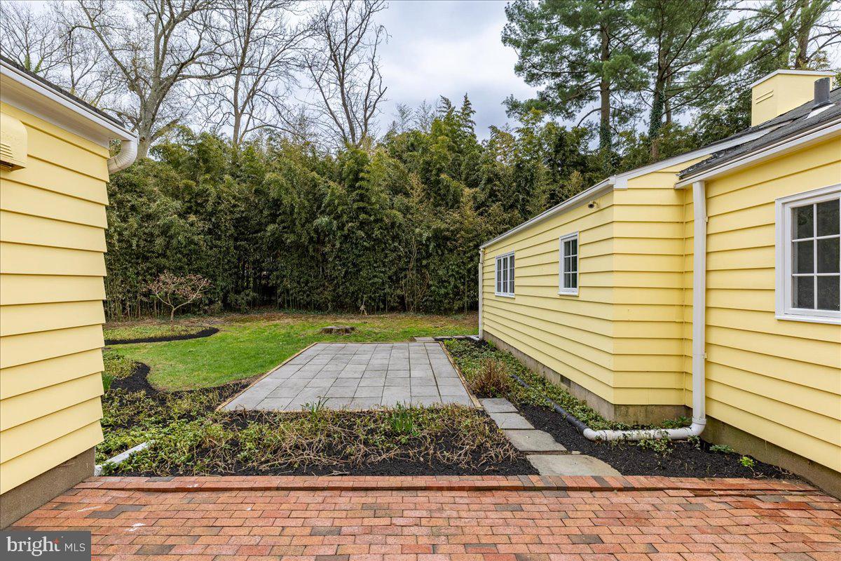 237 Elm Road Princeton, NJ 08540 - Photo 24 of 26 a view of a backyard with large trees and plants