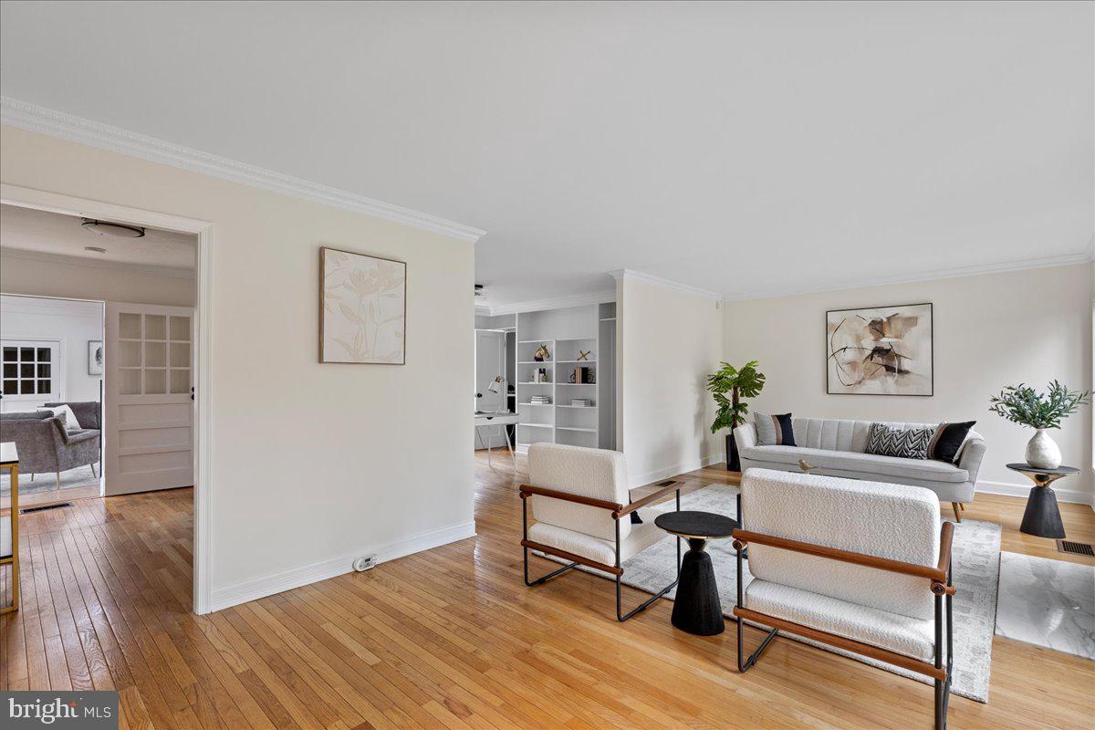 237 Elm Road Princeton, NJ 08540 - Photo 9 of 26 a living room with furniture and a wooden floor