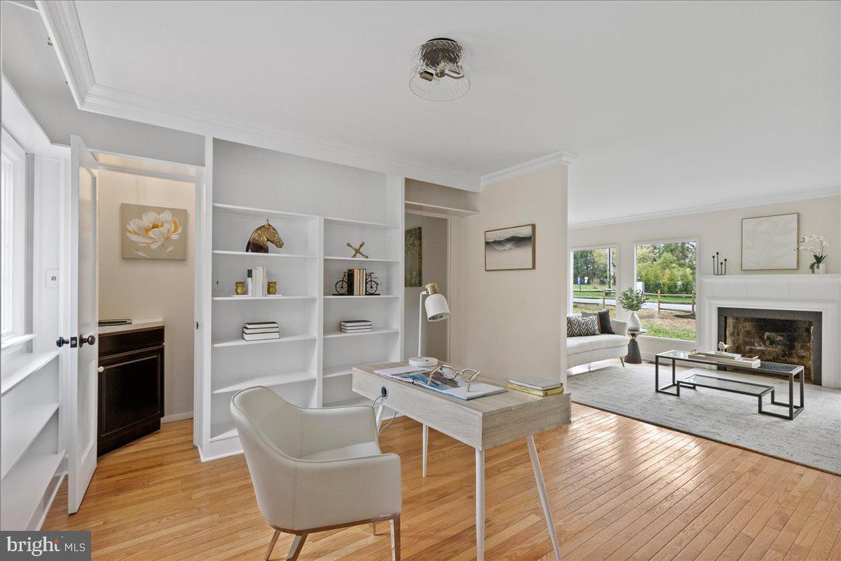 237 Elm Road Princeton, NJ 08540 - Photo 10 of 26 a living room with furniture and a fireplace