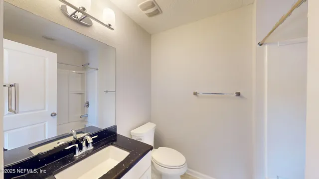 a view of empty room with windows